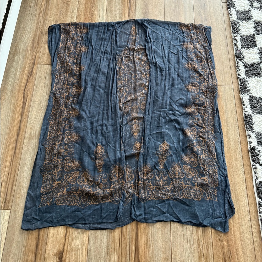 Navy shawl with brown patterns. One size